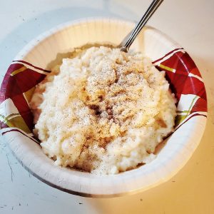 Rice pudding served in a paper bowl